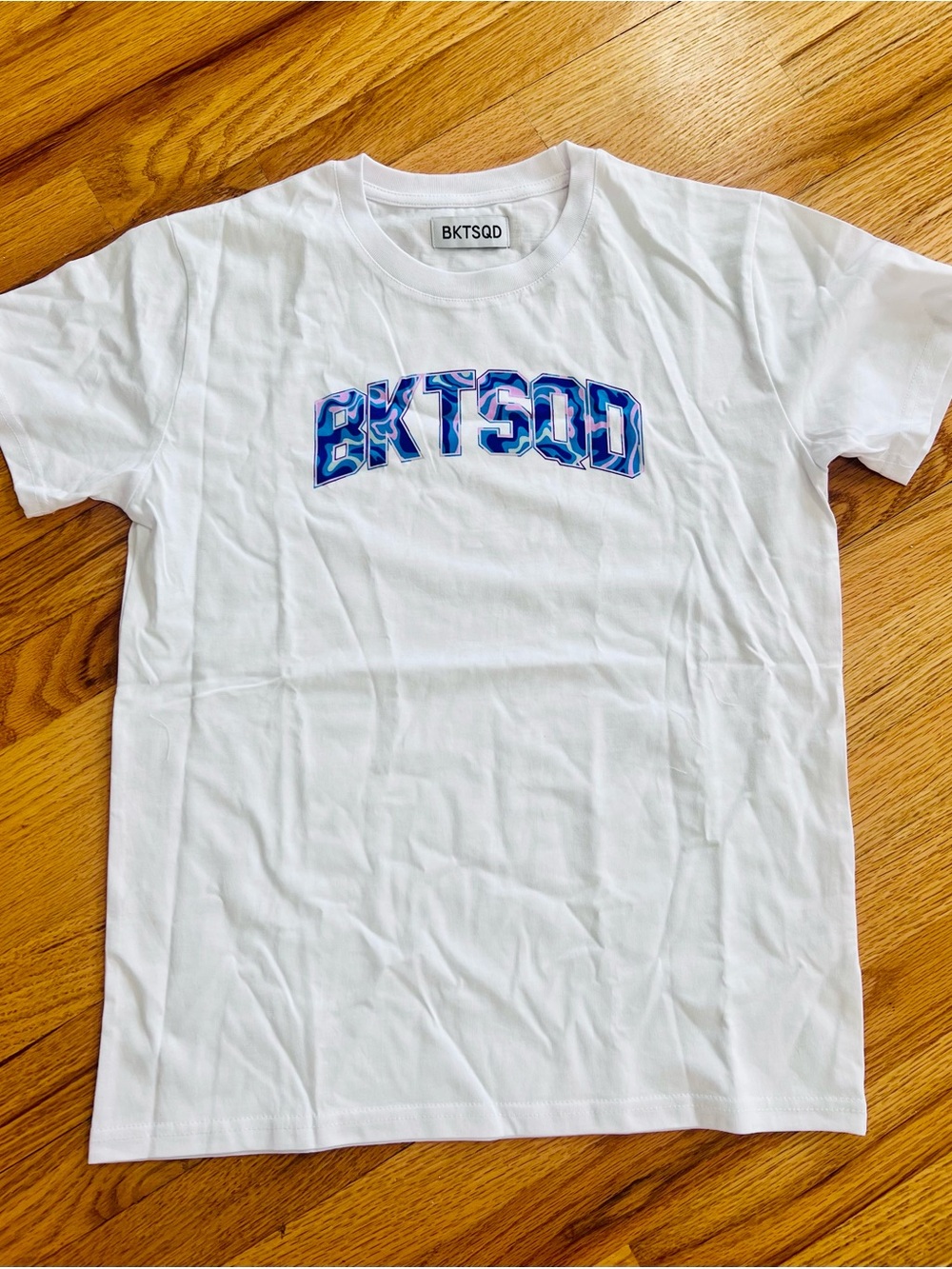 Kids White Graphic Logo Tee with Blue Accent
